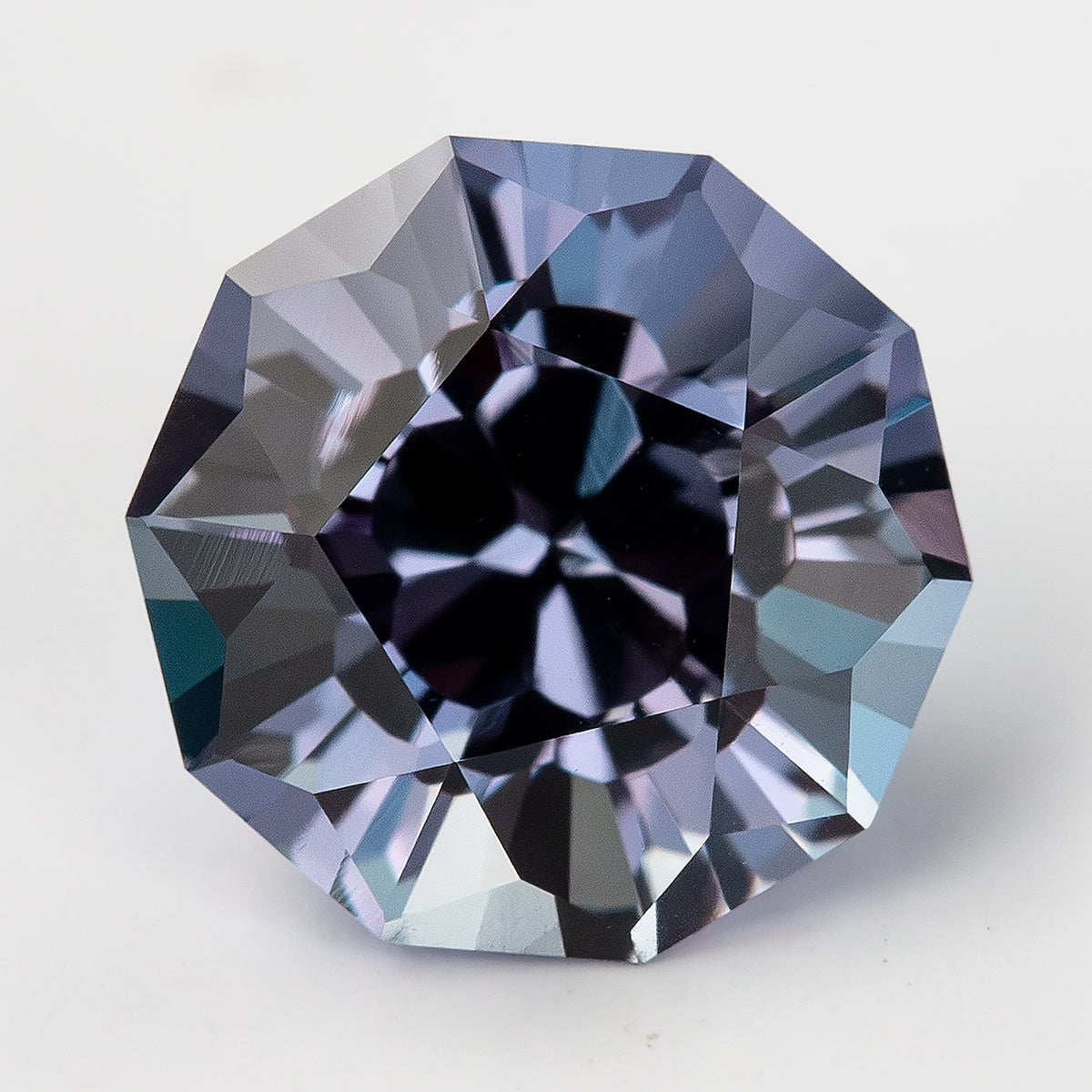 8 mm Sakura Cut Lab-Grown Color-Change Sapphire, GFCO Report, product photograph 1, a view.
