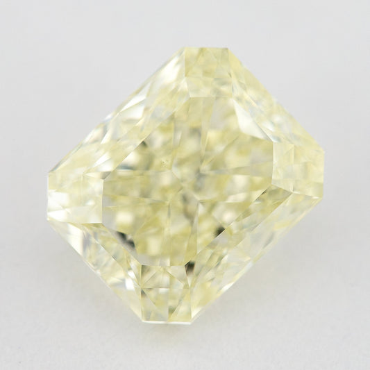 Face-up pale yellow rectangular diamond with clipped corners on a pale background, showing the full outline.