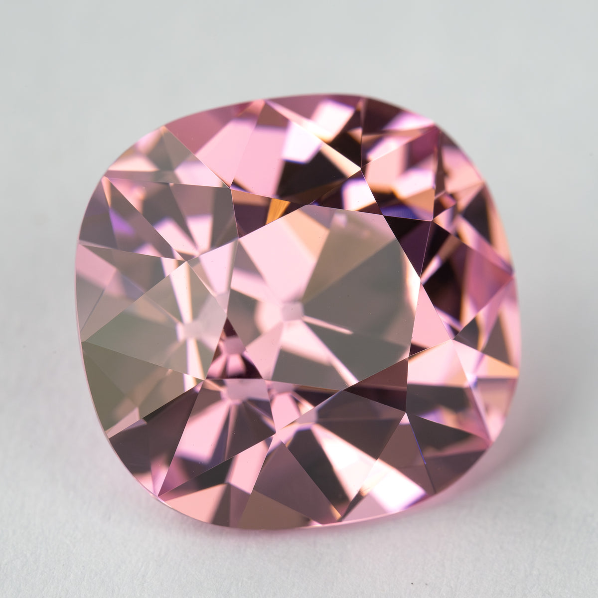 Pink cushion-shaped lab-grown YAG viewed face-up. View 8.