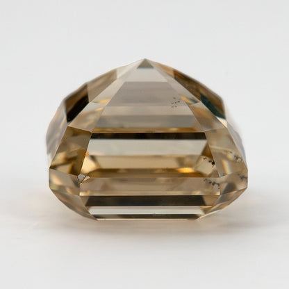 Full side profile of the square emerald-cut diamond showing crown height, girdle and stepped pavilion.