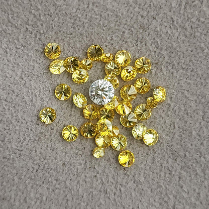 Yellow diamond cluster on grey with a white comparison diamond, not included.