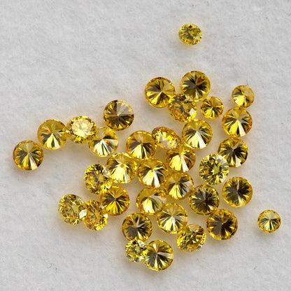 Loose yellow diamond cluster showing pavilion and crown views around an excluded white comparison.