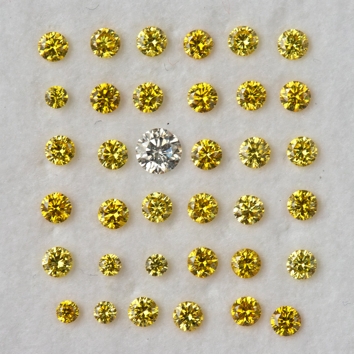 Alternate face-up yellow diamond rows with an excluded white comparison diamond.