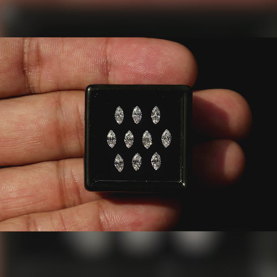 Ten marquise diamonds in a handheld display box, illustrating the calibrated supply; select a purchase quantity of 1, 2, 3 or 5 separately.
