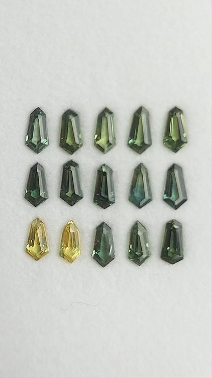 Green and yellow-green sapphire selection shown in rotating views of the fifteen-stone tray; sold one selected stone at a time.