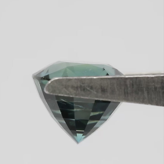 SL411 Deep Teal Blue Natural Sapphire rotation and scale video