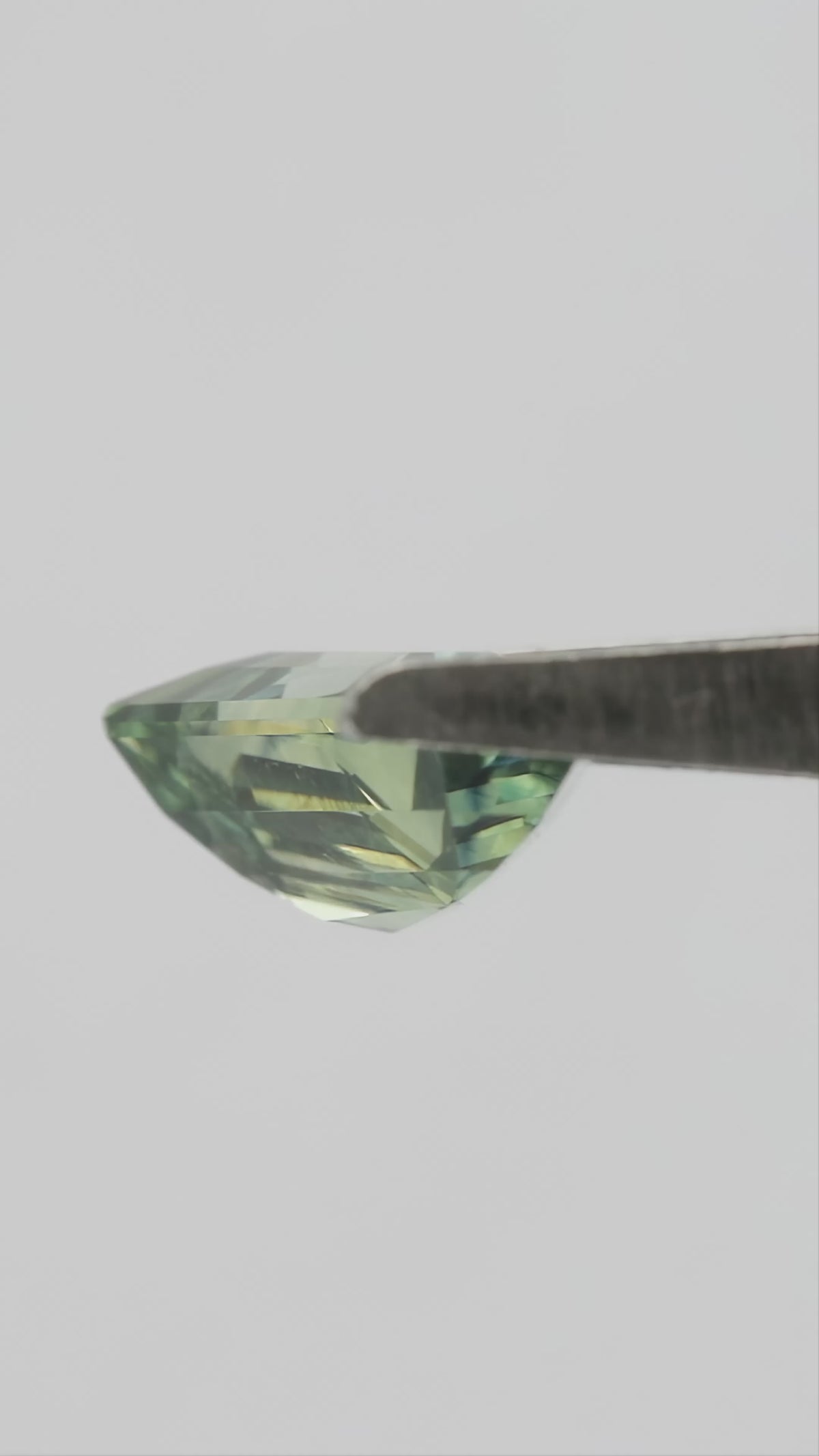 Video of 1.51 ct natural yellowish-bluish-green pentagon sapphire, SKU BNS159