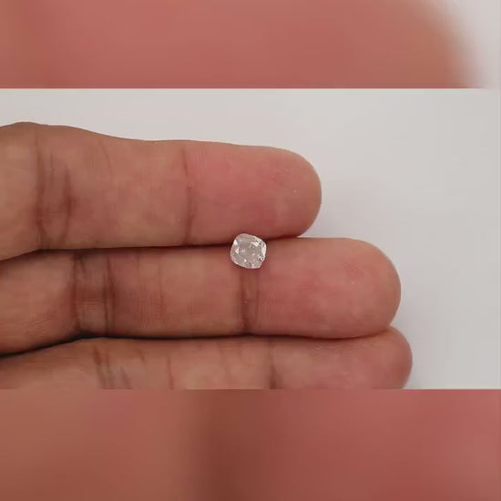 Video of the exact 1.02 ct natural light pink cushion diamond rotating on fingertips for relative size and color.