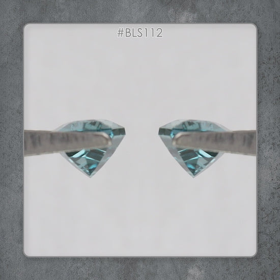 Second video view of the BLS114 teal lab-grown sapphire selection in motion.