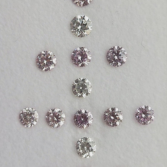 Purple-pink diamond size rows with white comparison diamonds, which are not included.
