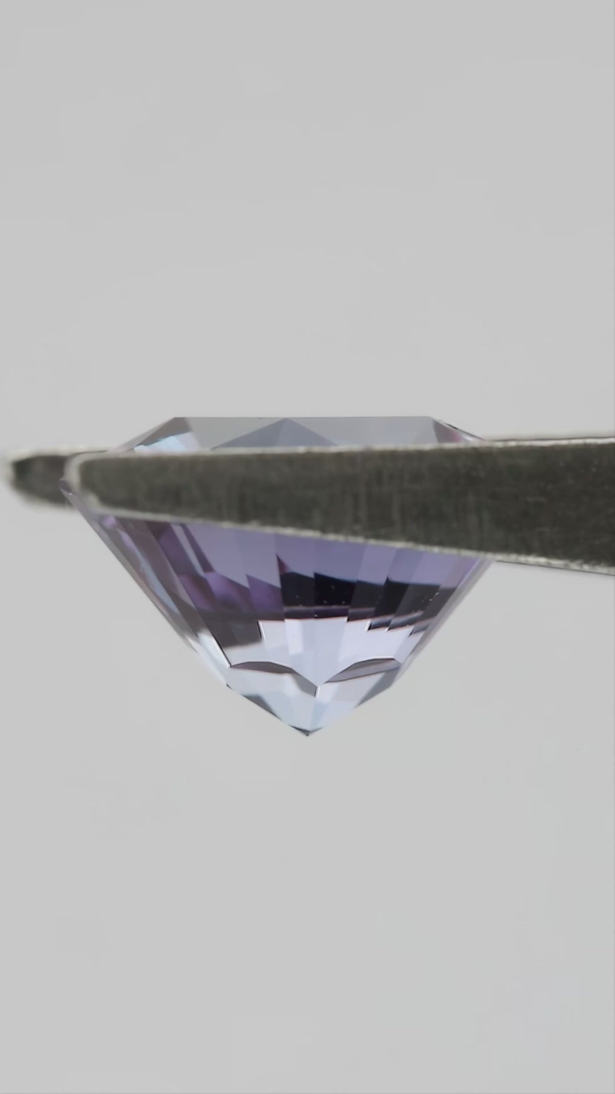 8 mm Sakura Cut Lab-Grown Color-Change Sapphire, GFCO Report, movement video 2 showing the loose stone's faceting and color response.