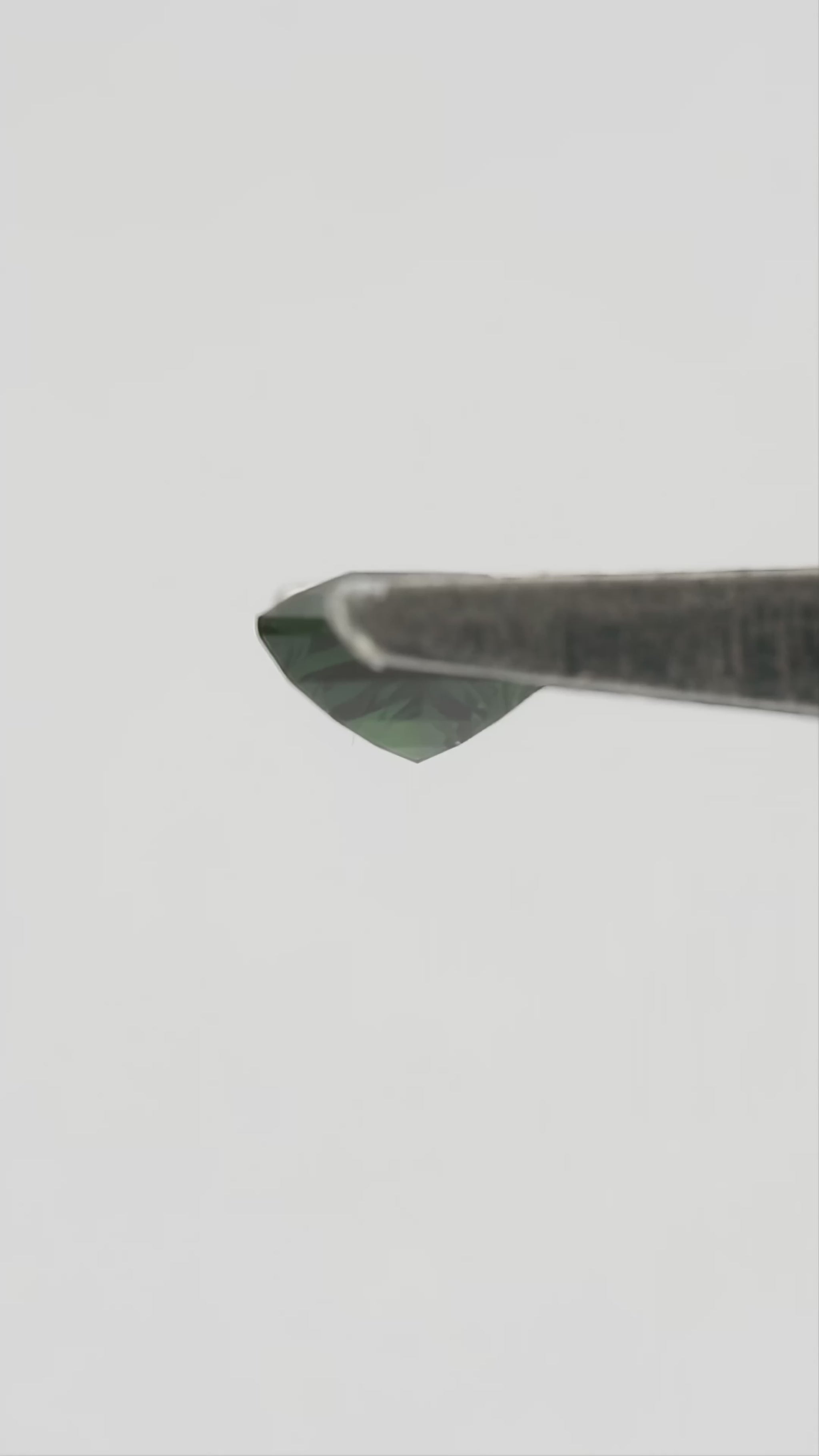 Video of 0.47 ct natural green lozenge sapphire, SKU BNS164