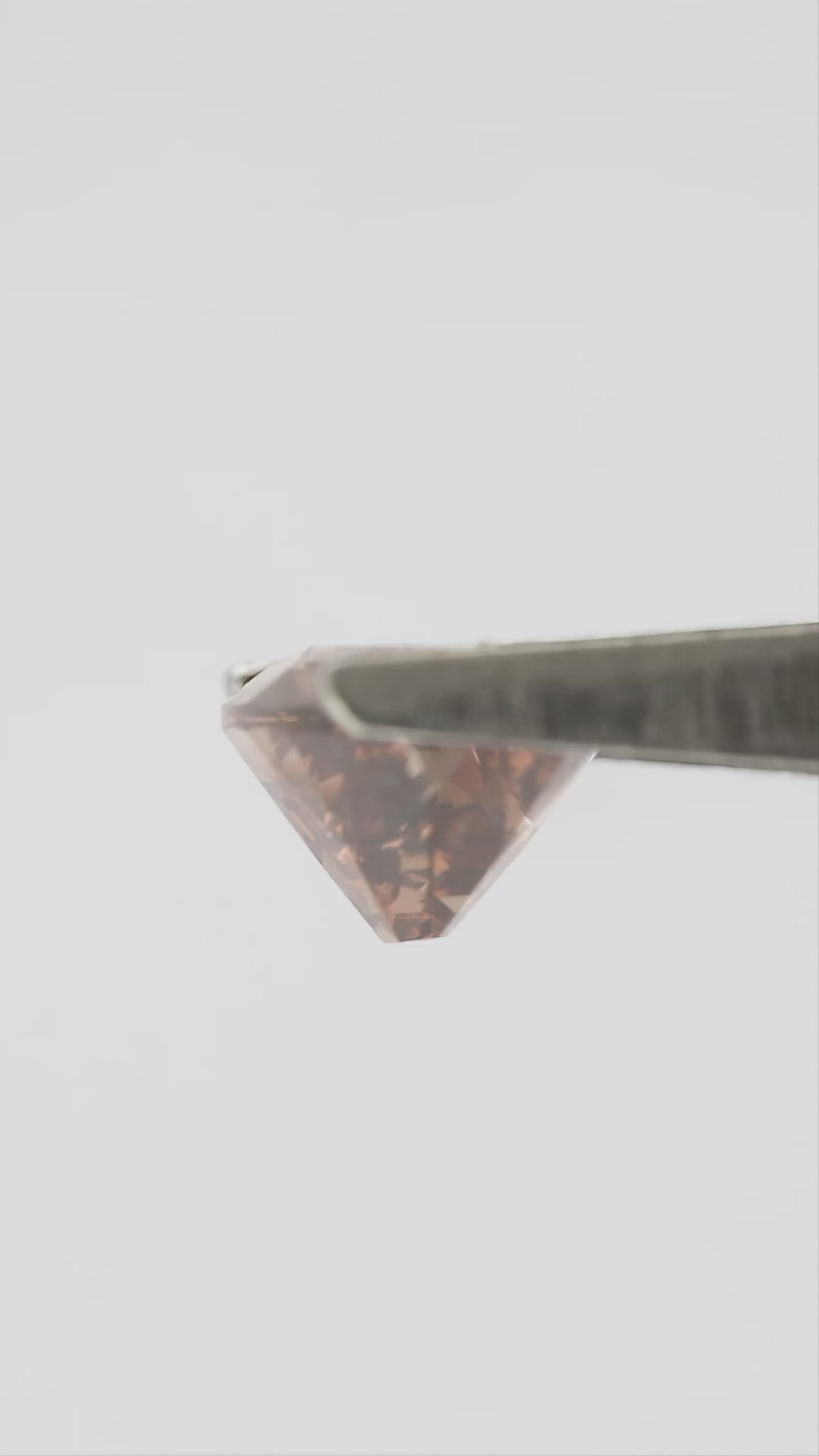 Video of 1.43 ct pinkish-brown lab-grown elongated oval diamond, SKU BLD154