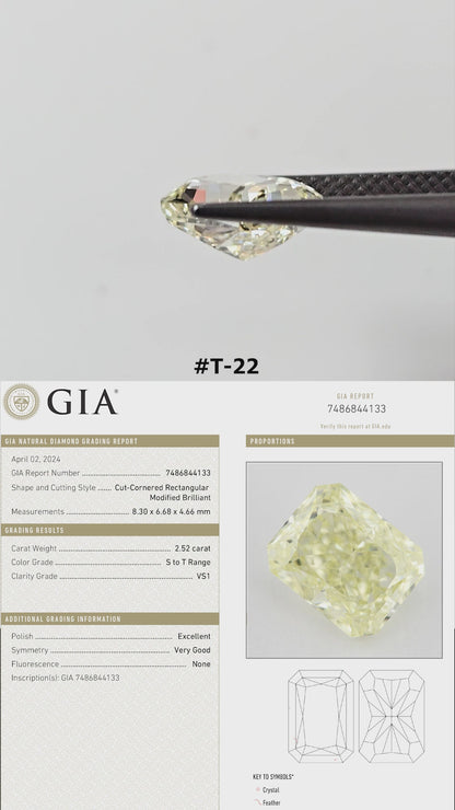 Yellow natural diamond rotating in tweezers and resting on fingertips for scale, with its corresponding GIA report beneath.