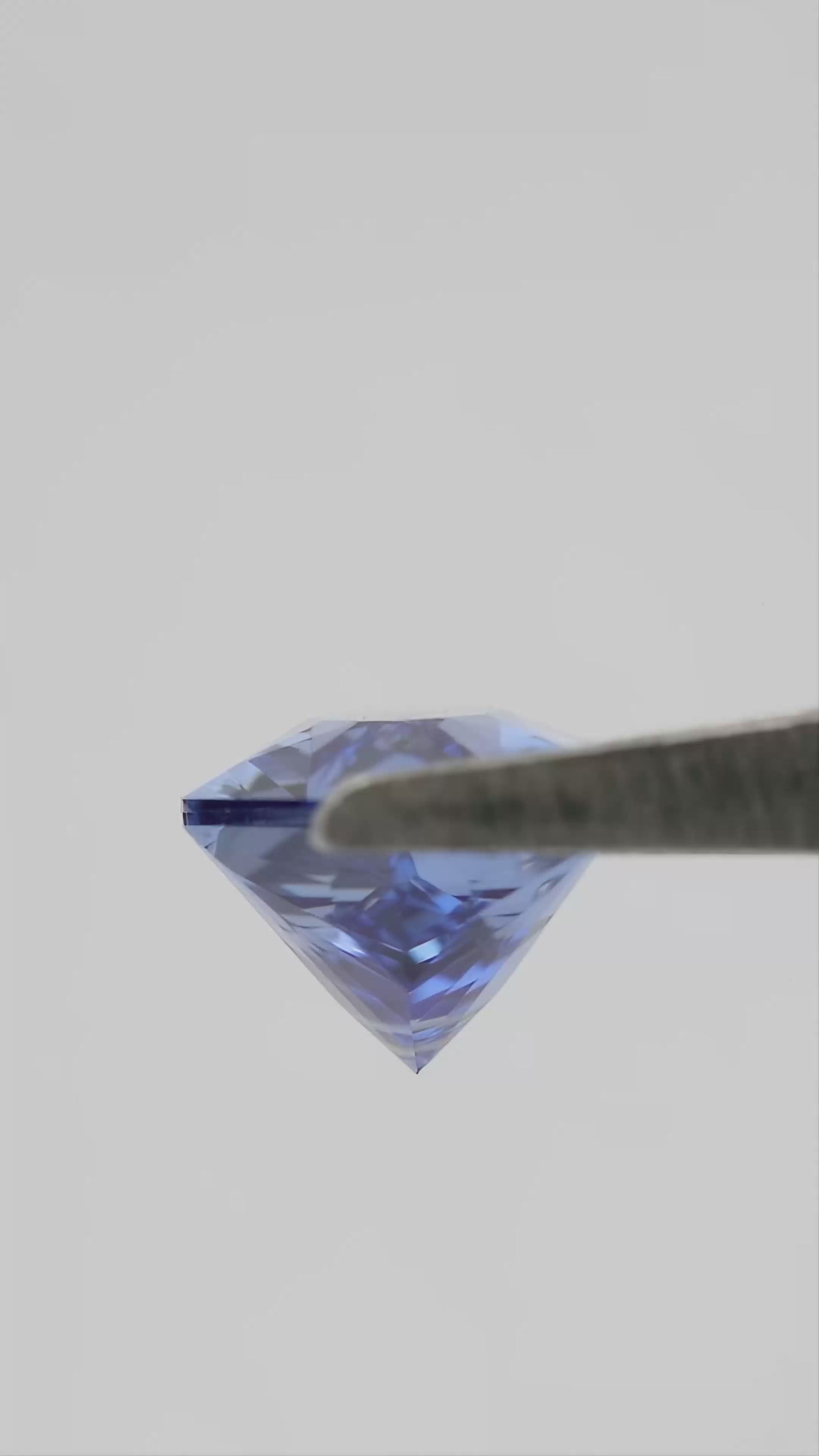 12 x 6 mm Royal Blue Lab-Grown Sapphire, BLS126 Brilliant Cut, movement video 2 showing the loose stone's faceting and color response.